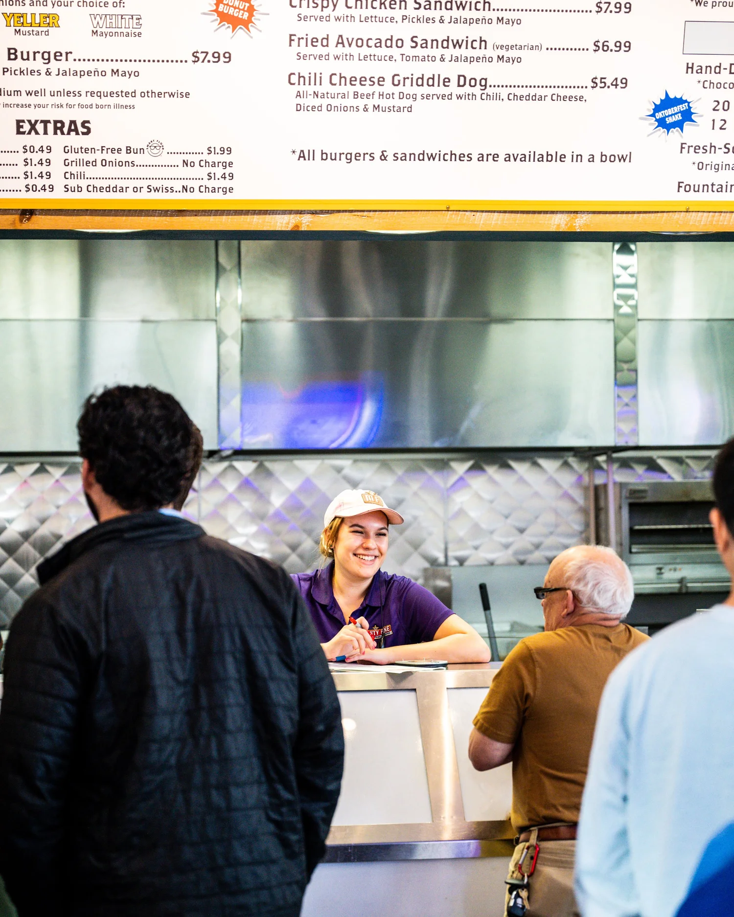 Mighty Fine Burgers crew serving guests